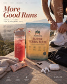 A lifestyle promotional scene on a rocky outdoor trail showing a person tying a white sneaker, with a bag of MATAYE Super Yerba Mate, a pink drink bottle, a small sachet, a phone, earbuds case, and a black bag arranged in the foreground. Large text reads More Good Runs and Natural Energy for a Brighter You.